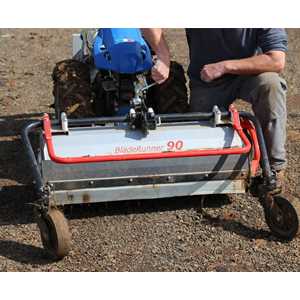 A hand crank on the top of the Flail Mower adjusts the mowing height by raising or lowering the caster wheels.