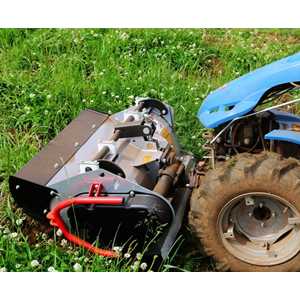 Instead of caster wheels that set the mowing height, the crank on the RollerBlade Flail raises and lowers the rear roller.  The rear roller helps prevent scalping.